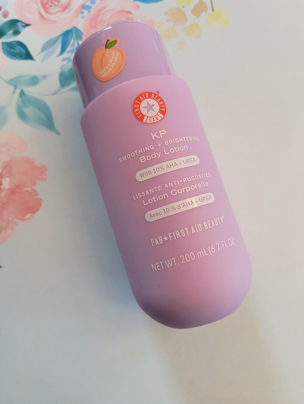 First Aid Beauty KP Smoothing + Brightening Body Lotion With AHA Urea -Peach